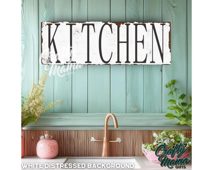 a kitchen sign hanging above a kitchen sink