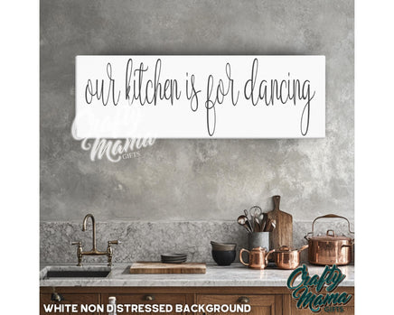 a kitchen with a sign that says our kitchen is for dancing