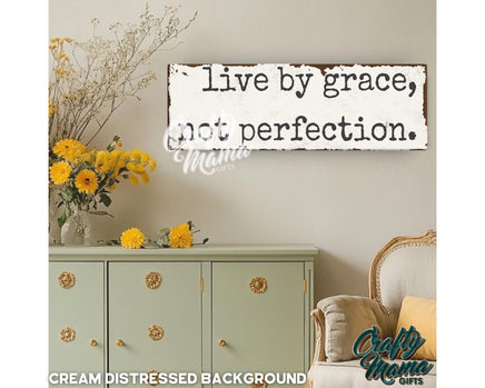 a sign that says live by grace, not perfection