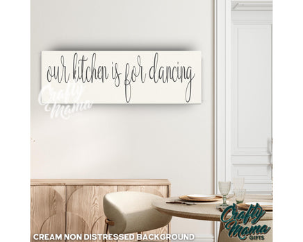a sign that says our kitchen is for dancing