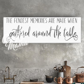 a kitchen counter with a sign above it that says the finest memories are made when