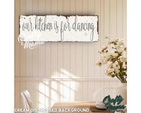 a sign that says our kitchen is for dancing