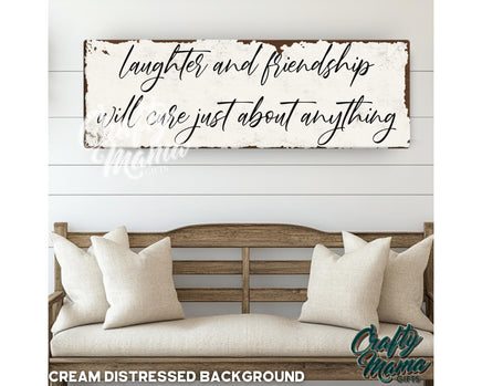 a wooden sign that says laughter and friends will be just about anything