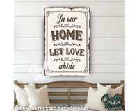 a sign that says in our home let love abide