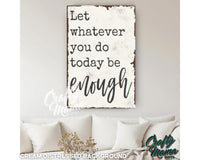 a sign that says let whatever you do today be enough